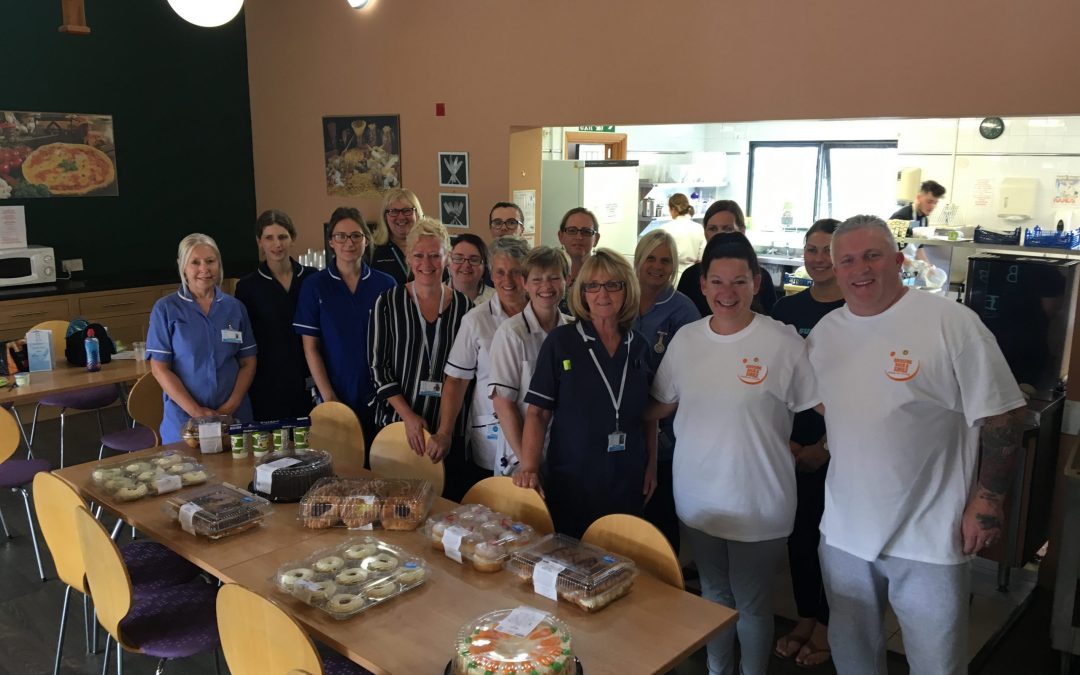 CHARITY SURPRISES PATIENTS AND STAFF AT BUTTERWICK HOSPICE WITH CAKE DAY.