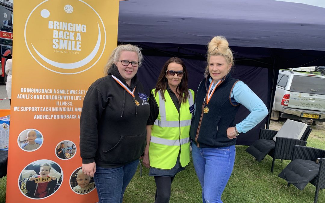 GUNG-HO GIRLS RAISE FUNDS FOR BRINGING BACK A SMILE.