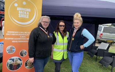 GUNG-HO GIRLS RAISE FUNDS FOR BRINGING BACK A SMILE.